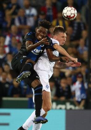 Club s David Okereke and Dynamo s Serhiy Sydorchuk fight for the ball during a game between Belgian soccer team Club Brugge and Ukrainian club Dynamo Kyiv, in the third qualifying round of the UEFA Champions League competition, Tuesday 06 August 2019 in Brugge. VIRGINIExLEFOUR  x05639506x