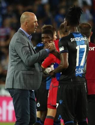 Club Brugge s head coach Philippe Clement and Club s Simon Deli pictured after a game between Belgian soccer team Club Brugge and Ukrainian club Dynamo Kyiv, in the third qualifying round of the UEFA Champions League competition, Tuesday 06 August 2019 in Brugge. VIRGINIExLEFOUR  x05639514x