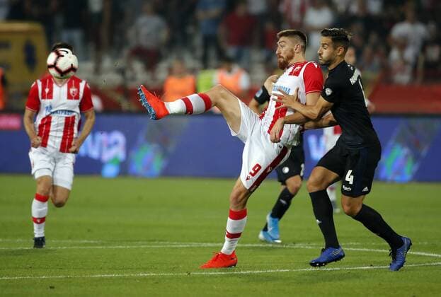(190807) -- BELGRADE, Aug. 7, 2019 -- Crvena Zvezda s Milan Pavkov (L) vies with FC Copenhagen s Sotirios Papagiannopoulos during the UEFA Champions League third qualifying round first leg football match between Crvena Zvezda and FC Copenhagen in Belgrade, Serbia on Aug. 6, 2019. ) (SP)SERBIA-BELGRADE-SOCCER-UEFA CHAMPIONS LEAGUE-CRVENA ZVEZDA VS FC COPENHAGEN PredragxMilosavljevic 