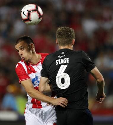 (190807) -- BELGRADE, Aug. 7, 2019 -- Crvena Zvezda s Milan Rodic (L) vies with FC Copenhagen s Jens Stage during the UEFA Champions League third qualifying round first leg football match between Crvena Zvezda and FC Copenhagen in Belgrade, Serbia on Aug. 6, 2019. ) (SP)SERBIA-BELGRADE-SOCCER-UEFA CHAMPIONS LEAGUE-CRVENA ZVEZDA VS FC COPENHAGEN PredragxMilosavljevic 