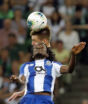 KRASNODAR, RUSSIA - AUGUST 7, 2019: Porto s Romario Baro (front) in the 2019 20 UEFA Champions League third qualifying round match between FC Krasnodar and FC Porto at Krasnodar Stadium. Valery Matytsin TASS  TS0B5B31