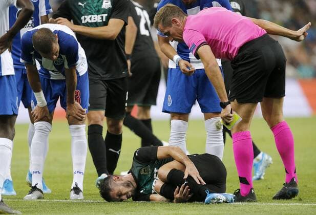 KRASNODAR, RUSSIA - AUGUST 7, 2019: Porto s Pepe, Krasnodar s Remy Cabella, and chief referee Tobias Stieler (L-R) in the 2019 20 UEFA Champions League third qualifying round match between FC Krasnodar and FC Porto at Krasnodar Stadium. Valery Matytsin TASS  TS0B5B3E