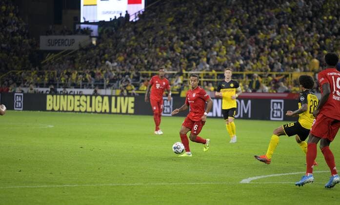 03.08.2019, Fussball 2019 2020, Supercup 2019, Borussia Dortmund - FC Bayern München, im Signal-Iduna-Park Stadion Dortmund, Werbebande von dem TV-Sender DAZN, Bundesliga Live ***DFL and DFB regulations prohibit any use of photographs as image sequences and or quasi-video.*** *** 03 08 2019, Football 2019 2020, Supercup 2019, Borussia Dortmund FC Bayern Munich, at Signal Iduna Park Stadion Dortmund, advertising band from TV station DAZN, Bundesliga Live DFL and DFB regulations prohibit any use of photographs as image sequences and or quasi video