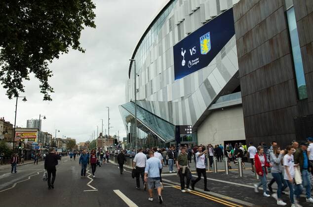 Football - 2019 2020 Premier League - Tottenham Hotspur vs. Aston Villa Fans arriving at the ground, at The Tottenham Hotspur Stadium. COLORSPORT ASHLEY WESTERN 