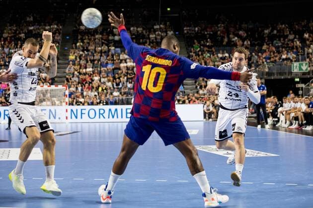 Helden des Handballs 2019; THW Kiel - FC Barcelona, Barca Ole Rahmel ( 22, THW Kiel), Cedric Sorhaindo ( 10, FC Barcelona), Miha Zarabec ( 24, THW Kiel); Helden des Handballs 2019; THW Kiel - FC Barcelona; Koeln, Lanxessarena Copyright: xBEAUTIFULxSPORTS Wunderlx