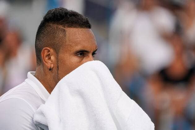 CINCINNATI, OH - AUGUST 12: Nick Kyrgios of Australia wipes sweat from his face during the Western & Southern Open at Lindner Family Tennis Center on August 12, 2019 in Mason, Ohio. (Photo by Adam Lacy Icon Sportswire) TENNIS: AUG 12 Western & Southern Open Icon190812046