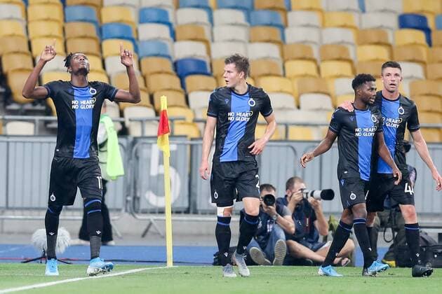 Club s Simon Deli (L) celebrates after scoring during a soccer game between Ukrainian club Dynamo Kyiv and Belgian team Club Brugge KV, Tuesday 13 August 2019 in Kyiv, Ukraine, the return match in the third qualifying round of the UEFA Champions League. Club won the first leg 1-0. BRUNOxFAHY  x05642866x