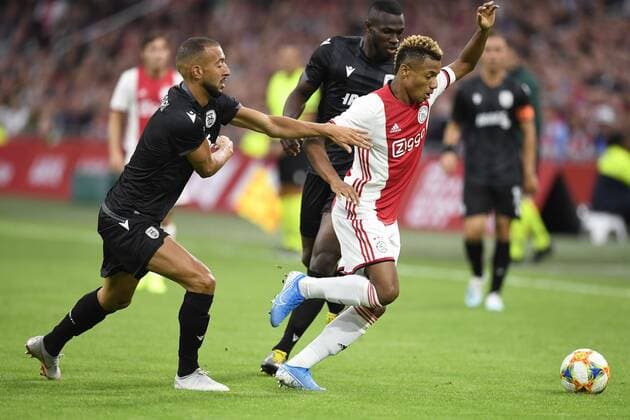 AMSTERDAM , 13-08-2019 , Johan Cruijff ArenA , Champions League third qualifying round season 2019-2020 , PAOK player Omar El Kaddouri and Ajax player David Neres during the match Ajax - PAOK Ajax - PAOK  x4105200x Copyright: