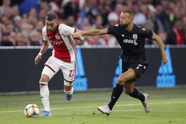 (l-r) Hakim Ziyech of Ajax, Omar El Kaddouri of PAOK FC during the UEFA Champions League third round qualifying second leg match between Ajax Amsterdam and PAOK FC at the Johan Cruijff Arena on August 13, 2019 in Amsterdam, The Netherlands UEFA Champions League 2019 2020 xVIxVIxImagesx xMauricexvanxSteenxIVx 200941847
