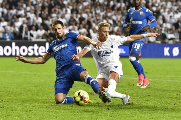 Viktor Fischer, FC Koebenhavn (7) og Milos Degenek, Roede Stjerne (8) kaemper om bolden i Champions League kval. kampen mellem FC Koebenhavn og Roede Stjerne i Parken i Koebenhavn tirsdag den 13. august 2019.. , Denmark Copyright: AndersxKjaerbye xRitzauxScanpixx COP101 spdk20190813-213943-L