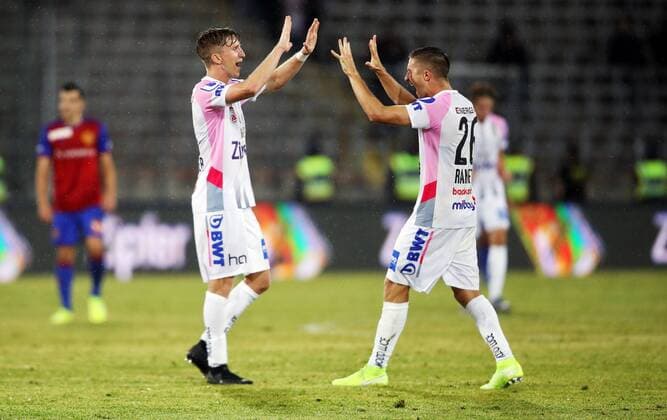 SOCCER - CL qualification, LASK vs Basel LINZ,AUSTRIA,13.AUG.19 - SOCCER - UEFA Champions League, qualification, LASK vs FC Basel. Image shows the rejoicing of Philipp Wiesinger and Reinhold Ranftl (LASK). GEPAxpictures xMatthiasxHauer