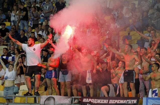 August 13, 2019, Kiev, Ukraine: Fans of Dynamo Kyivburn flares during the UEFA Champions League third qualifying round second leg football match between FC Dynamo Kyiv and Club Brugge KV, at the Olimpiyskiy stadium, in Kiev, Ukraine, 13 August 2019. Brugge vs Dynamo Kyiv UEFA Champions League qualifying round - ZUMAg194 20190813_zap_g194_014 Copyright: xSergxGlovnyx
