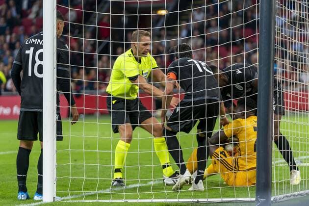 AMSTERDAM, Netherlands, 13-08-2019, football, Johan Cruijff ArenA, Champions League third qualifying round, season 2019-2020, Fighting in the goal for the ball, during the match Ajax - PAOK, Final score : 3-2 Ajax - PAOK  x4106034x Copyright: