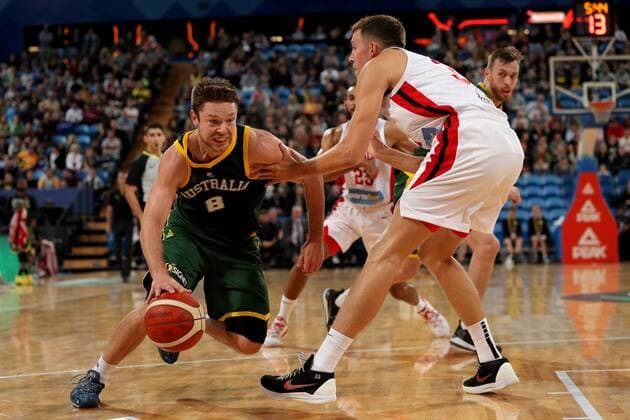 BASKETBALL AUSTRALIA CANADA, Matthew Dellavedova (left) of the Boomers drives past Kyle Wiltjer of Canada during the first Australia v Canada basketball match at RAC Arena in Perth, Friday, August 16, 2019. ( NO ARCHIVING, EDITORIAL USE ONLY, NO USE IN BOOKS WITHOUT CONSENT PERTH WA AUSTRALIA  Copyright: xRICHARDxWAINWRIGHTx 20190816001413554545
