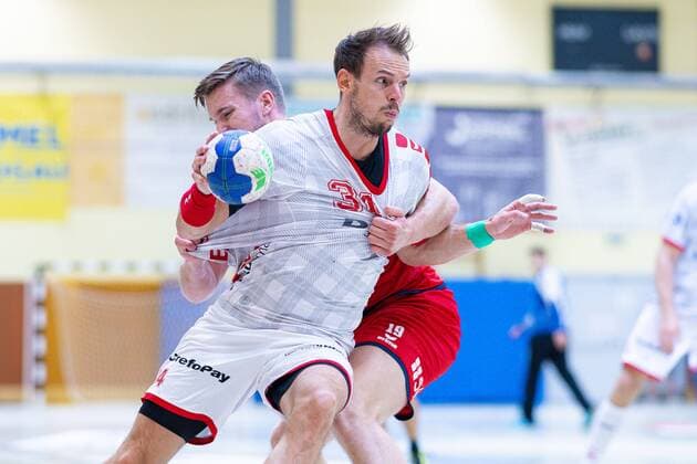 Rodgau, Deutschland 18. August 2019 DHB Pokal - 19 20 - MT Melsungen vs. SG BBM Bietigheim Kai Häfner Haefner (Melsungen), Vetle Ronningen (SG BBM Bietigheim) Rodgau Deutschland