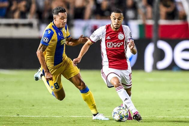 NICOSIA , 20-08-2019 , GSP Stadium , Champions League playoff, season 2019-2020 , APOEL Nicosia player Lucas Souza, Ajax player Noussair Mazraoui during the match APOEL Nicosia - Ajax APOEL Nicosia - Ajax  x4149570x Copyright: