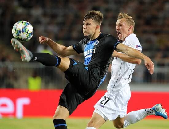 SOCCER - CL, play off, LASK vs Bruegge LINZ,AUSTRIA,20.AUG.19 - SOCCER - UEFA Champions League, play off, LASK vs FC Bruegge. Image shows Eduard Sobol (Bruegge) and Thomas Goiginger (LASK). GEPAxpictures xWalterxLuger