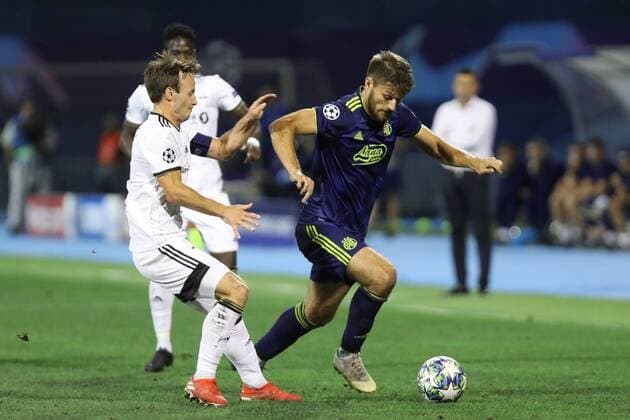 Zagreb, 21 08 2019 - Stadion Maksimir, Play-offs, 1st leg. GNK Dinamo (blue) - Rosenborg BK (white) Bruno Petkovic (21) vs Mike Jensen (7) 