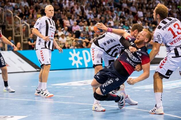 Pixum Super Cup 2019, SG Flensburg-Handewitt - THW Kiel, 21.08.2019 Hendrik Pekeler ( 61, THW Kiel), Jim Gottfridsson (24, SC Flensburg-Handewitt), Steffen Weinhold ( 13, THW Kiel), Pixum Super Cup 2019, SG Flensburg-Handewitt - THW Kiel, ISS Dome, Duesseldorf Copyright: xBEAUTIFULxSPORTS Wunderlx