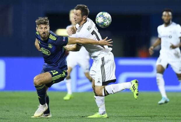 PXL_UEFA Champions League Play-offs, GNK Dinamo vs Rosenborg BK 21.08.2019., Zagreb, Croatia - UEFA Champions League Play-offs, 1st leg between GNK Dinamo and Rosenborg BK at Maksimir Stadium in Zagreb, Croatia. Bruno Petkovic, Even Hovland.  JosipxRegovic PIXSELL