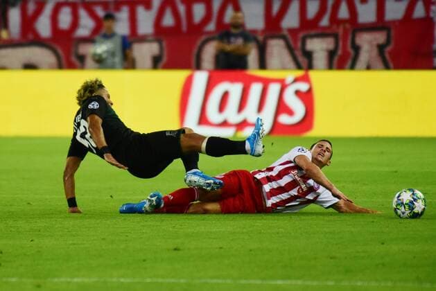 Greece: Olympiacos vs Krasnodar Podence (no 10) of Olympiacos makes foul to Vilhena (no 52) of Krasnodar. Piraeus Attiki Greece Stadio Georgics Karaiskakis  DimitriosxKarvountzis PacificxPress