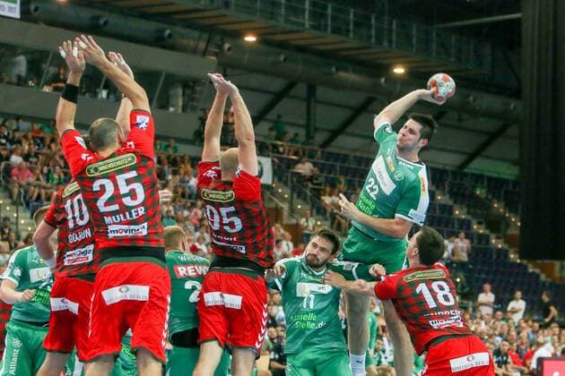 DHfK - Fuechse Berlin Handball Leipzig, 25.08.2019, Arena Leipzig, Handball, 1. Bundesliga, 1. Spieltag , SC DHfK - Füchse Berlin , Im Bild v.l.: Jakov Gojun (10, Füchse Berlin), Michael Müller Mueller (25, Füchse Berlin), Paul Drux (95, Füchse Berlin), Lukas Binder (11, Leipzig) und Marko Mamic (22, Leipzig) ,