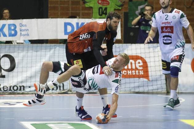 25.08.2019, Swiss Life Hall, Hannover, Ligaspiel, 1. Liga, TSV Hannover-Burgdorf vs GWD Minden, im Bild Mait Patrail (9, Han.-Burgdorf) reisst im Zweikampf Christoffer Rambo (9, Minden) um TSV Hannover-Burgdorf vs GWD Minden