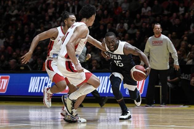 26th August 2019; Qudos Bank Arena, Sydney, New South Wales, Australia; International Basketball, United Sates of America Basketball versus Canada Basketball; Kemba Walker of USA dribbles the ball down the court under pressure from Andrew Nembhard of Canada - Editorial Use Only.  ActionPlus12163453 NigelxOwen
