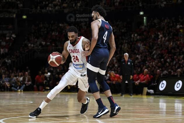 26th August 2019; Qudos Bank Arena, Sydney, New South Wales, Australia; International Basketball, United Sates of America Basketball versus Canada Basketball; Khem Birch of Canada pushes past Derrick White of USA - Editorial Use Only.  ActionPlus12163482 NigelxOwen