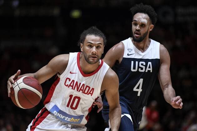 26th August 2019; Qudos Bank Arena, Sydney, New South Wales, Australia; International Basketball, United Sates of America Basketball versus Canada Basketball; Kaza Kajami-Keane of Canada is followed closely by Derrick White of USA - Editorial Use Only.  ActionPlus12163485 NigelxOwen