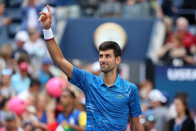 (190827) -- NEW YORK, Aug. 27, 2019 -- Novak Djokovic of Serbia greets the audience after the men s singles first round match between Novak Djokovic (R) of Serbia and Roberto Carballes Baena of Spain at the 2019 US Open in New York, the United States, Aug. 26, 2019. ) (SP)U.S.-NEW YORK-TENNIS-US OPEN-MEN S SINGLES LixMuzi 