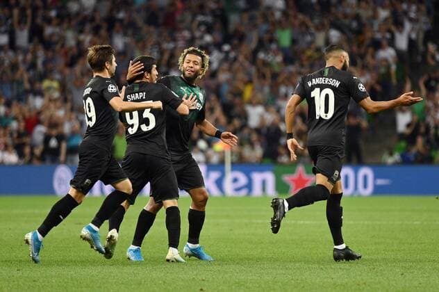 KRASNODAR, RUSSIA - AUGUST 27, 2019: FC Krasnodar s Dmitry Slotsky, Magomed Suleimanov, Tonny Vilhena, and Wanderson (L-R) celebrate a goal in the sesond leg of the 2019-20 UEFA Champions League play-off football match between FC Krasnodar and Olympiacos CFP at Krasnodar Stadium. Maxim Romanov TASS  TS0B8328