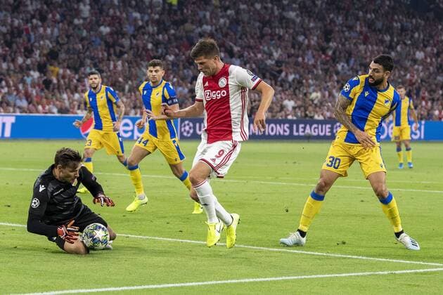 AMSTERDAM , 29-08-2019 , Johan Cruijff ArenA , Champions League playoff, season 2019-2020 , APOEL Nicosia keeper Vid Belec , Ajax player Klaas Jan Huntelaar and APOEL Nicosia player Giorgos Merkis during the match Ajax - APOEL Nicosia Ajax - APOEL Nicosia  x4211736x Copyright: