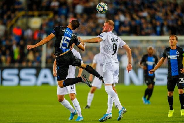 SOCCER - CL play off, Bruegge vs LASK BRUGES,BELGIUM,28.AUG.19 - SOCCER - UEFA Champions League, play off, FC Bruegge vs LASK. Image shows Matej Mitrovic (Bruegge) and Joao Klauss De Mello (LASK). GEPAxpictures xJasminxWalter