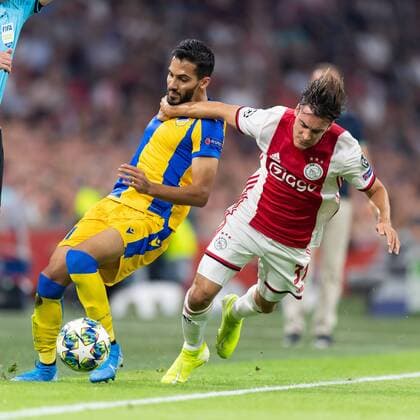 Amsterdam, Netherlands, 28.08.2019, UEFA Champions League, Play-off, Ajax Amsterdam - APOEL Nikosia, Nicolas Tagliafico (Ajax) und Musa Suleiman (Nikosia) im zweikampf, battle for the ball ( Amsterdam Netherlands eu-images-01061008718