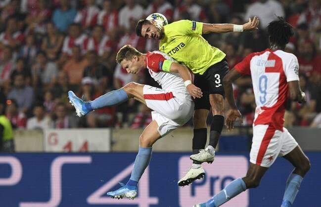 From left MILAN SKODA of Slavia and ANDREI BURCA of CFR Cluj in action during the Football Champions League 4th qualifying round return match: Slavia Prague vs Cluj-Napoca in Sinobo Stadium, Prague, Czech Republic, August 28, 2019. (CTKxPhoto MichalxKamaryt) CTKPhotoP201908281008201  _KMT6624