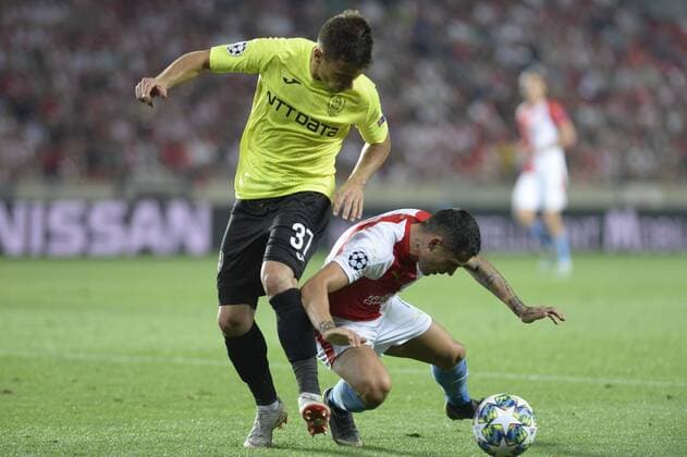 From left MIHAI BORDEIANU of CFR Cluj and NICOLAE STANCIU of Slavia in action during the Football Champions League 4th qualifying round return match: Slavia Prague vs Cluj-Napoca in Sinobo Stadium, Prague, Czech Republic, August 28, 2019. (CTKxPhoto KaterinaxSulova) CTKPhotoP201908281032301  _SUK7772