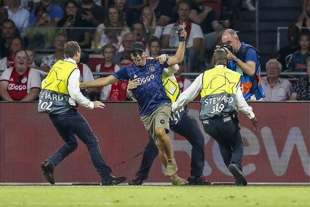 AMSTERDAM , 29-08-2019 , Johan Cruijff ArenA , Champions League playoff, season 2019-2020 , Pitch intruder during the match Ajax - APOEL Nicosia. Final score 2-0. Ajax - APOEL Nicosia  x4212369x Copyright: