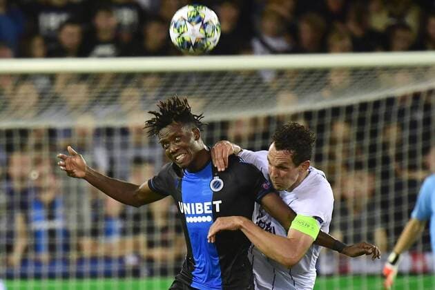 BRUGGE, BELGIUM - AUGUST 28 : David Okereke forward of Club Brugge battles for the ball with Emanuel Pogatetz of LASK during the Champions League Play-offs 2nd leg match game between Club Brugge and LASK on August 28, 2019 in Brugge, Belgium, 28 08 2019 ( Photo by Peter De Voecht Photonews FOOTBALL : Club Brugge vs LASK - Champions League Play-offs - 28 08 2019 PHOTONEWS PANORAMIC 