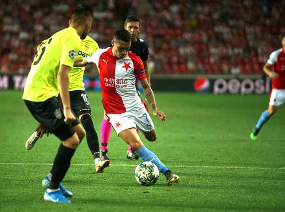 (190829) -- PRAGUE, Aug. 29, 2019 -- Slavia Prague s Nicolae Stanciu (R) competes during the 2nd leg match between Slavia Prague and Romanian Cluj at the UEFA Champions League play-offs, in Prague, the Czech Republic, on Aug. 28, 2019. (Photo by Dana Kesnerova Xinhua) (SP)CZECH REPUBLIC-PRAGUE-SOCCER-UEFA CHAMPIONS LEAGUE-SLAVIA VS CLUJ YangxXiaohong 