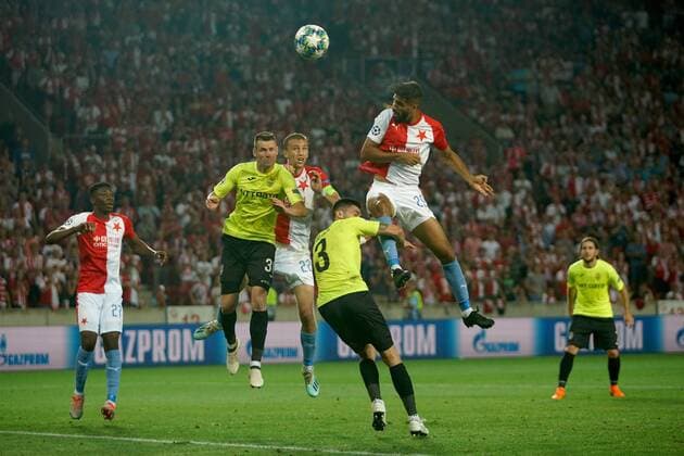 (190829) -- PRAGUE, Aug. 29, 2019 -- Slavia Prague s Abdulla Yusuf Helal (2nd R) heads the ball during the 2nd leg match between Slavia Prague and Romanian Cluj at the UEFA Champions League play-offs, in Prague, the Czech Republic, on Aug. 28, 2019. (Photo by Dana Kesnerova Xinhua) (SP)CZECH REPUBLIC-PRAGUE-SOCCER-UEFA CHAMPIONS LEAGUE-SLAVIA VS CLUJ YangxXiaohong 