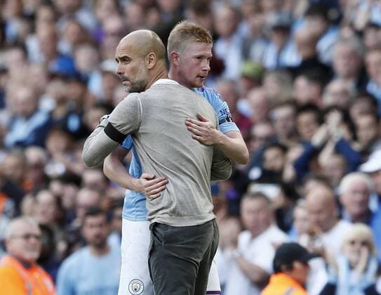Josep Guardiola manager of Manchester City hugs Kevin De Bruyne of Manchester City during the Premier League match at the Etihad Stadium, Manchester. Picture date: 31st August 2019. Picture credit should read: Simon Bellis Sportimage EDITORIAL USE ONLY. No use with unauthorised audio, video, data, fixture lists, club league logos or live services. Online in-match use limited to 120 images, no video emulation. No use in betting, games or single club league player publications. SPI-0174-0022
