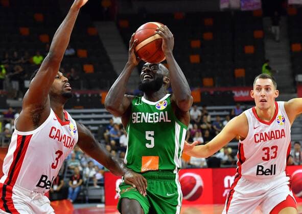 (190905) -- DONGGUAN, Sept. 5, 2019 -- Xane Dalmeida (C) of Senegal competes during the group H match between Senegal and Canada at the 2019 FIBA World Cup in Dongguan, south China s Guangdong Province, Sept. 5, 2019. ) (SP)CHINA-DONGGUAN-BASKETBALL WM FIBA WORLD CUP-GROUP H-SENEGAL VS CANADA (CN) ZhuxZheng 