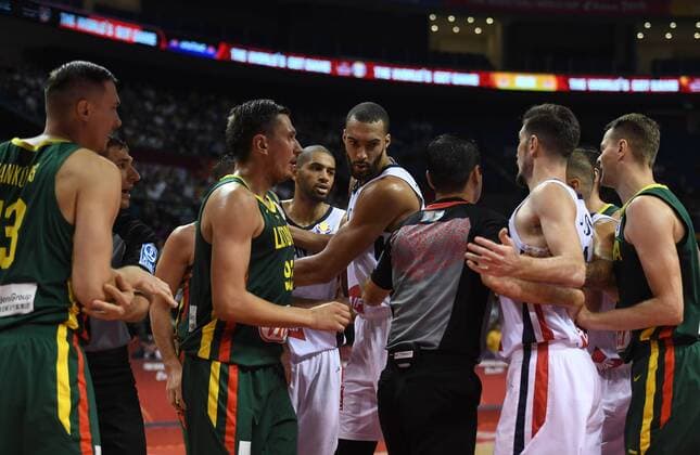 (190907) -- NANJING, Sept. 7, 2019 -- Players of France and Lithuania argue with each other during the group L match between France and Lithuania at the 2019 FIBA World Cup in Nanjing, east China s Jiangsu Province, Sept. 7, 2019. ) (SP)CHINA-NANJING-BASKETBALL-FIBA WORLD CUP-GROUP L-FRA VS LTU(CN) HanxYuqing 
