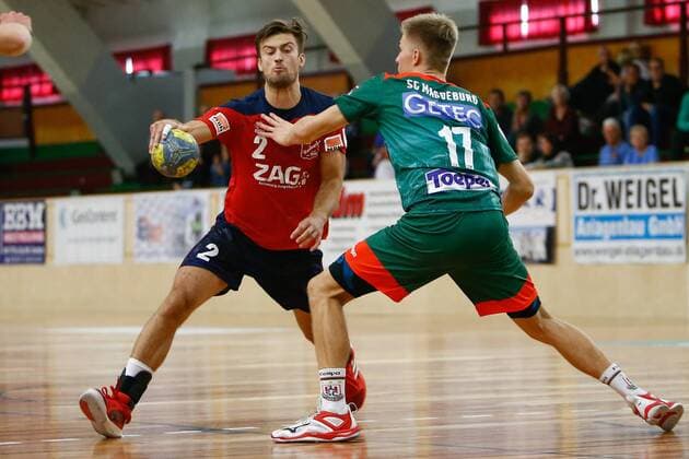 08.09.2019, xtgx, Handball 3. Liga, SC Magdeburg II - TUS VinnhorstI emspor, v.l. Florian Freitag (Vinnhorst), Luka Baumgart (Magdeburg) Zweikampf, Duell, Kampf, tackle Magdeburg