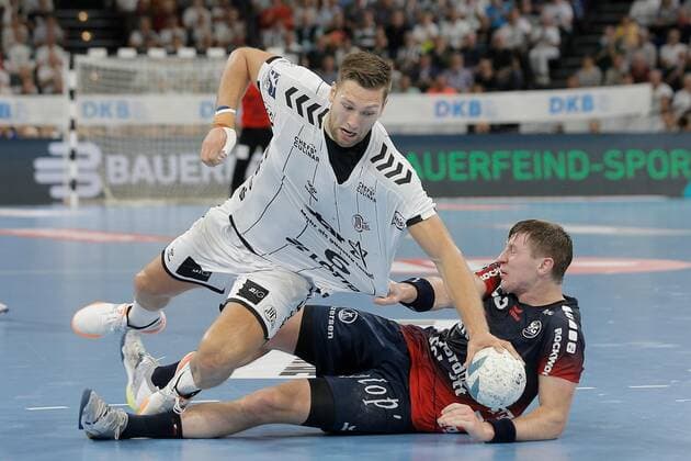 1.Handball Bundesliga THW Kiel - Flensburg Handewitt, Kiel, 12.9.2019 Harald Reinkind ( Kiel, 6 ) im Zweikampf gegen Göran Johannessen ( Flensburg , 23 ). Copyright: xBEAUTIFULxSPORTS DRPx