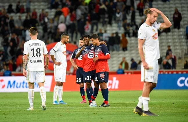 Fußball, OSC Lille - SCO Angers Joie de Abou Ouattara ( LOSC ) - Benjamin Andre ( LOSC ) FOOTBALL : Lille OSC vs Angers SCO - Ligue 1 - Lille - 13 09 2019 FedericoPestellini Panoramic 