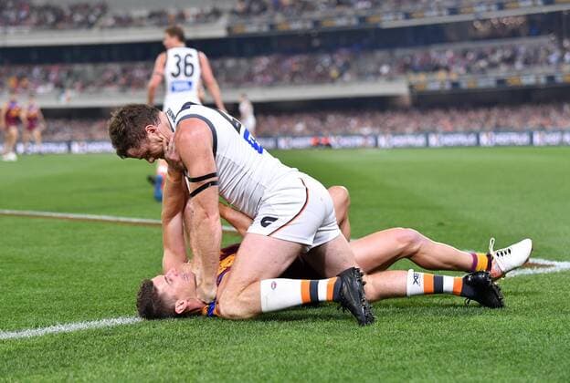 Bilder des Jahres 2019, Sport 09 September Sport Themen der Woche KW37 AFL LIONS GIANTS, Dayne Zorko (bottom) of the Lions is seen wrestling with Heath Shaw (top) of the Giants during the Second Semi Final match between the Brisbane Lions and the Greater Western Sydney Giants during week 2 of the AFL Finals Series at the Gabba in Brisbane, Saturday, September 14, 2019. ( NO ARCHIVING, EDITORIAL USE ONLY, NO USE IN BOOKS WITHOUT CONSENT BRISBANE QLD AUSTRALIA  Copyright: xDARRENxENGLANDx 20190914001419444082