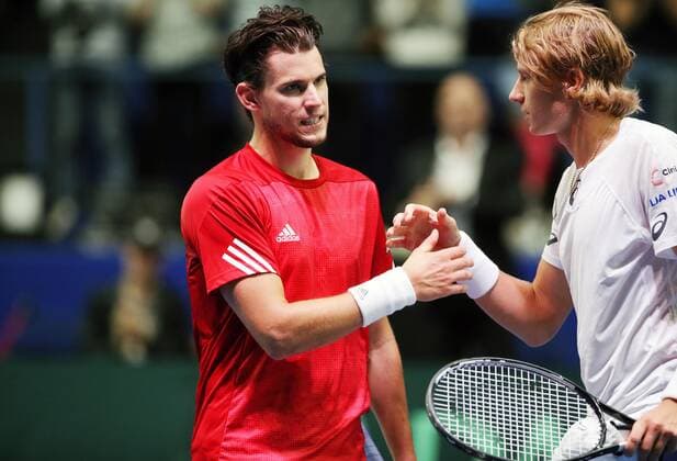 TENNIS - Davis Cup, FIN vs AUT ESPOO,FINLAND,14.SEP.19 - TENNIS - ITF Davis Cup, first round, Finland vs Austria. Image shows Dominic Thiem (AUT) and Emil Ruusuvuori (FIN). GEPAxpictures xMatthiasxHauer