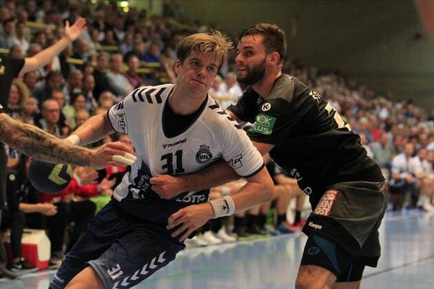 2.Bundesliga Handball VfL Luebeck-Schwartau - HC Elbflorenz 2006 14.09.2019, Hansehalle Luebeck, GER, VfL Luebeck-Schwartau - HC Elbflorenz 2006 im Bild picture shows Dadi Runarsson VfL Luebeck-Schwartau im Zweikampf gegen Sebastian Greß Gress (HC Elbflorenz 2006)